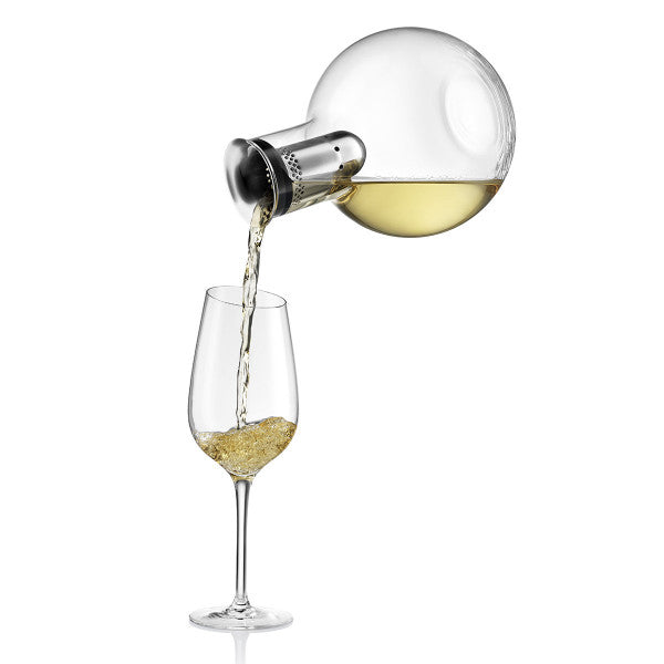 Eva Solo Cool Wine Decanter pouring white wine into wine glass